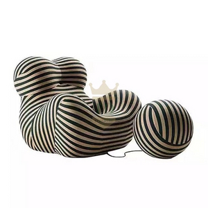 Modern Mother's Embrace Chair With Ball Footstool