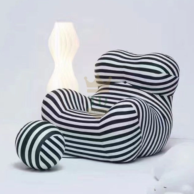 Modern Mother's Embrace Chair With Ball Footstool